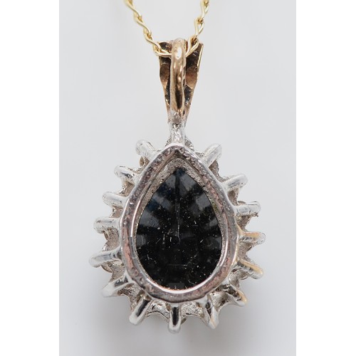 19 - A 9ct gold sapphire and single cut diamond cluster pendant on a chain, 2g