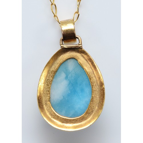 26 - A 14K gold larimar pendant on a chain, 20mm, 3.7g
