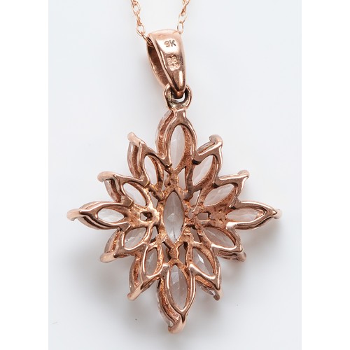 31 - A 9ct rose gold quartz cluster pendant on a chain, 2.1g