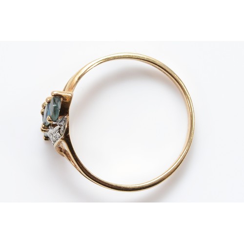 37 - A 9ct gold emerald and diamond dress ring, N 1/2, 1.5g