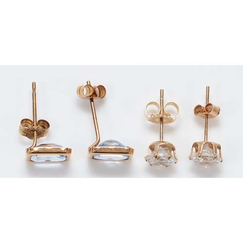 50 - Two pairs of 9ct gold gemset earrings with scroll backs, 1.5g