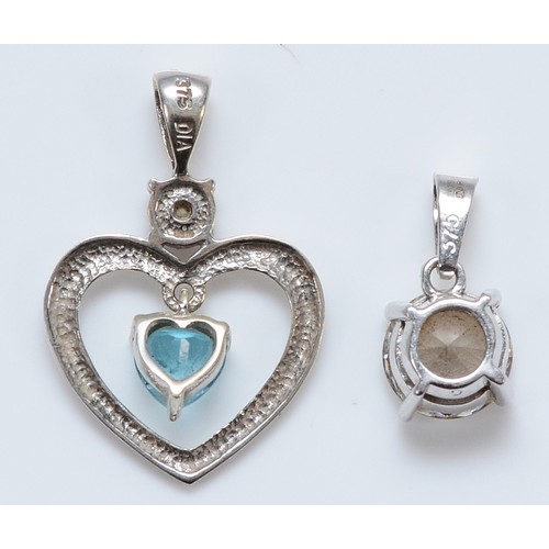 54 - A 9ct white gold diamond and gemset heart pendant, 23mm, with a 9ct white gold gemset pendant, 7mm g... 