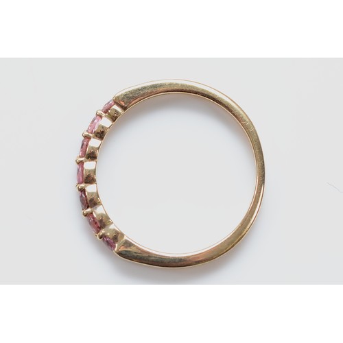 A 9ct gold pink tourmaline seven stone ring, N, 1.9g