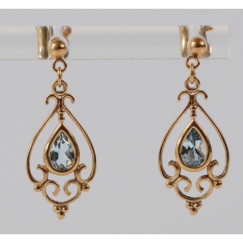 326 - A pair of 9ct gold blue topaz drop earrings with scroll backs, 25mm, 1.4g