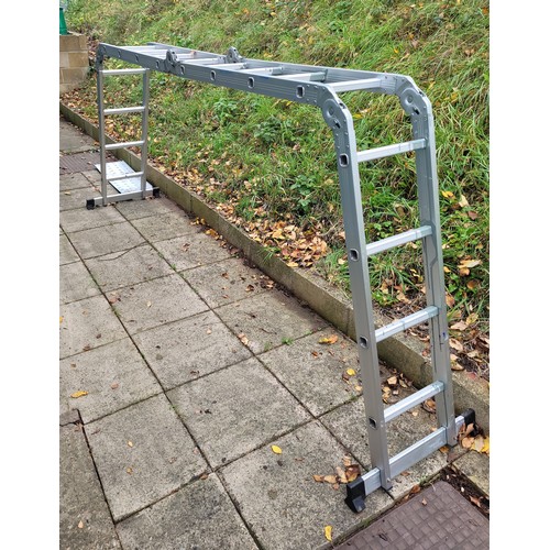 1 - A set of aluminium folding multi-purpose ladders, with four rungs to each section, overall length 45... 