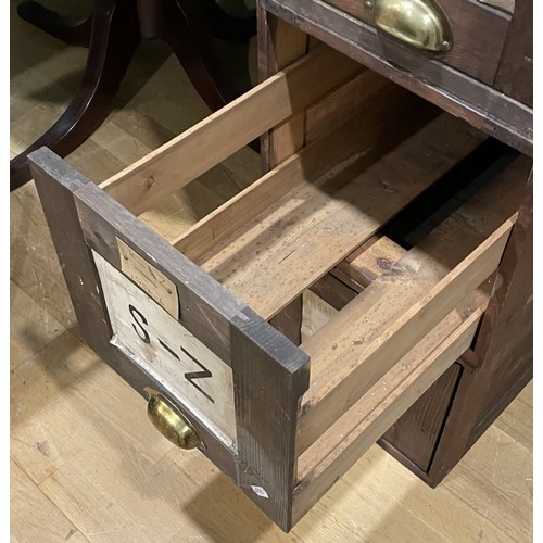 2 - A bank of four early 20th century individual pine filing drawers, having brass cup handles, W35, H32... 