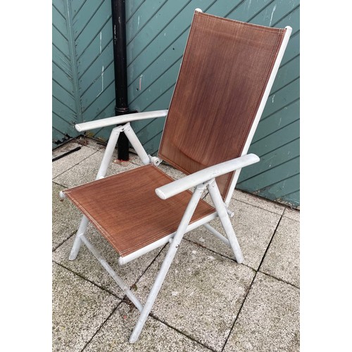 17 - A set of four painted aluminium recliner garden chairs. (4)