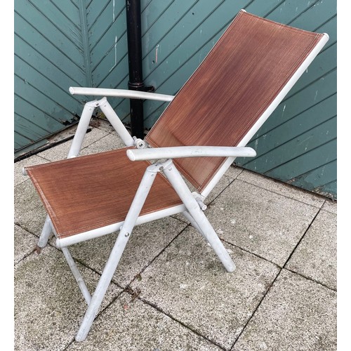 17 - A set of four painted aluminium recliner garden chairs. (4)
