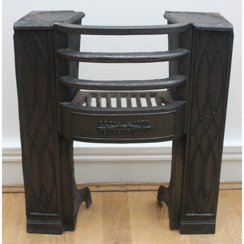 25 - An Arts & Crafts cast iron fire grate, W44, H50, D19cm, together with a steel and wire mesh firescre... 