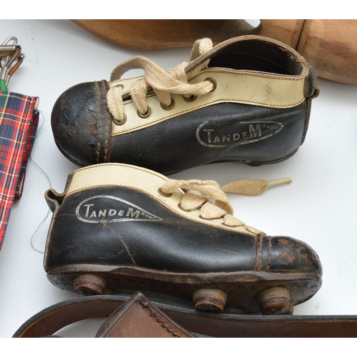 28 - One box of vintage leather and wooden items, to include, Tandem football boots, horse tac, and cobbl... 