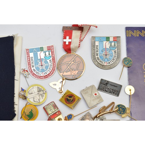 36 - A Biathlon SM Unteriberg 1977 medal with ribbon, together with a large quantity of 1970s Biathlon an... 