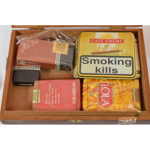 41 - A collection of tobacco related collectables to include cigars by makers Castella and Churchill, cig... 