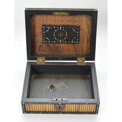 43 - A porcupine quill and ebonised wood trinket box 20cm x 15cm x 8cm.