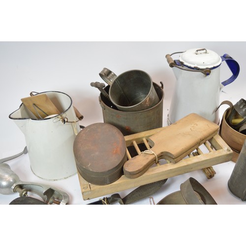 46 - A large box of kitchenalia, to include, butter pats, a bean slicer, pastry cutters, and a pudding st... 