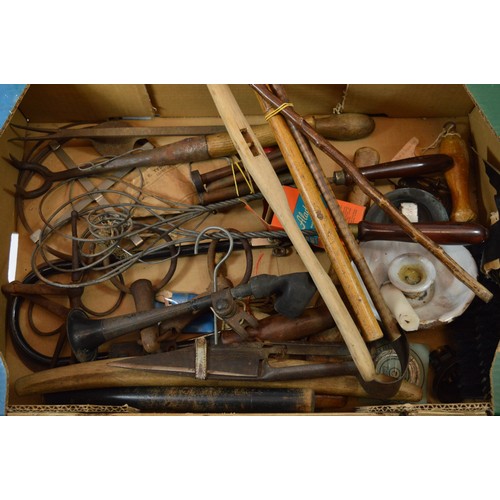 47 - Two boxes of vintage items, to include, carpet beaters, walking sticks, whipping tops, and a paraffi... 