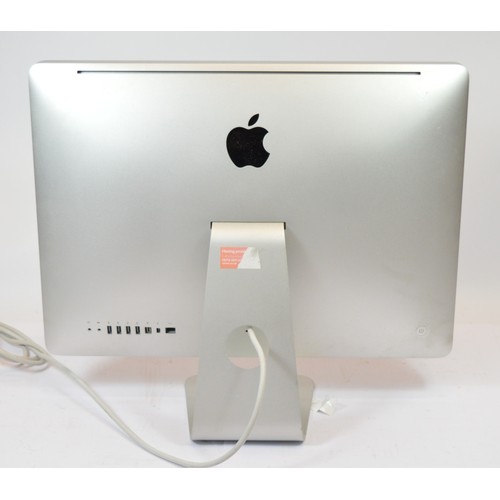 56 - Two Apple wireless keyboards, one boxed, together with an Apple 24 inch monitor. (3)