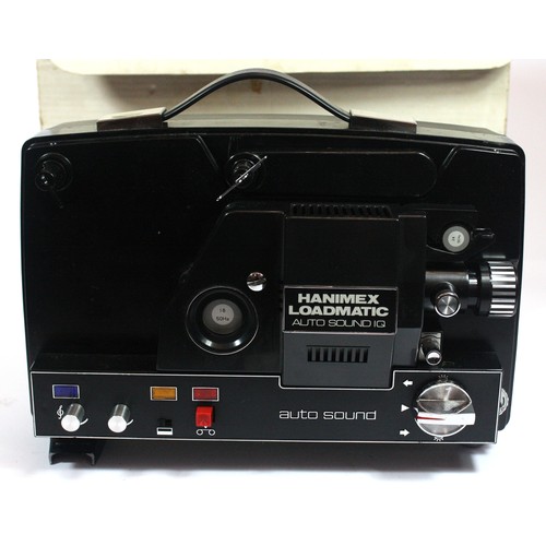 59 - Haminex Loadmatic Auto Sound IQ projector with four reels to include Cinderella and Mary Poppins.
