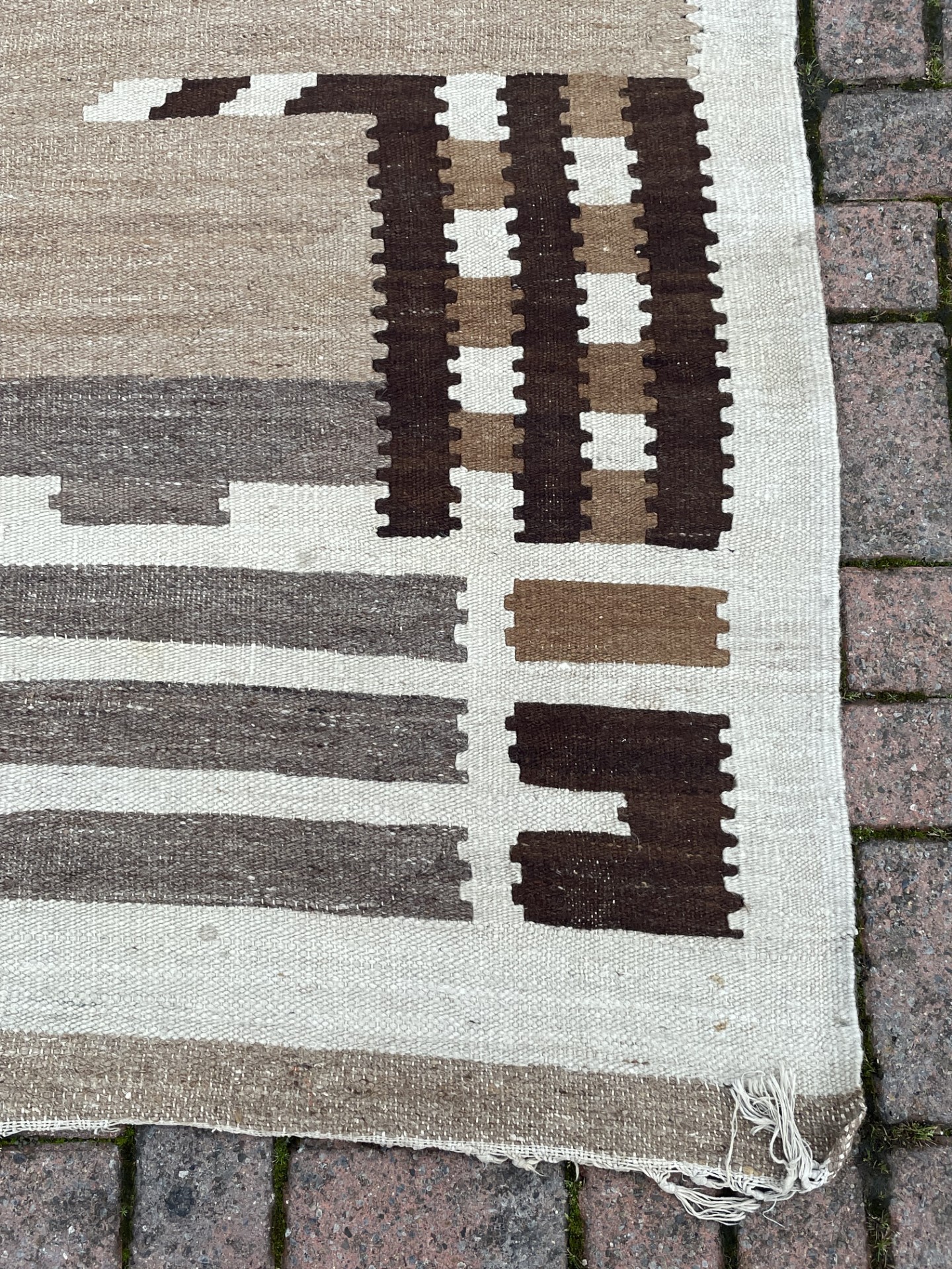 An Egyption Kilim hand woven flatweave rug, beige and browns with a ...