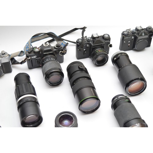 An assortment of camera lenses with two Zenit film cameras, examples to ...