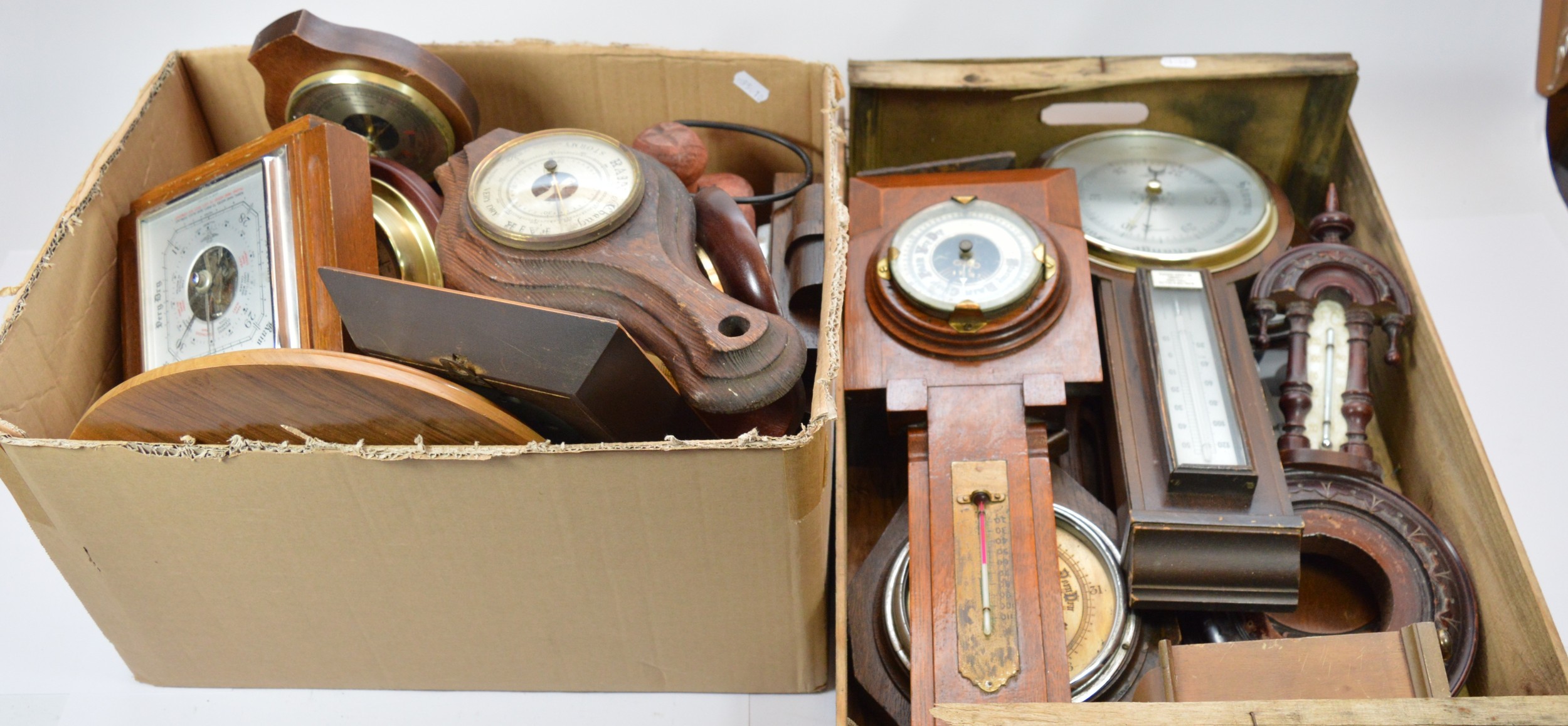 Two boxes of 20th century wall barometers, together with a box of ...
