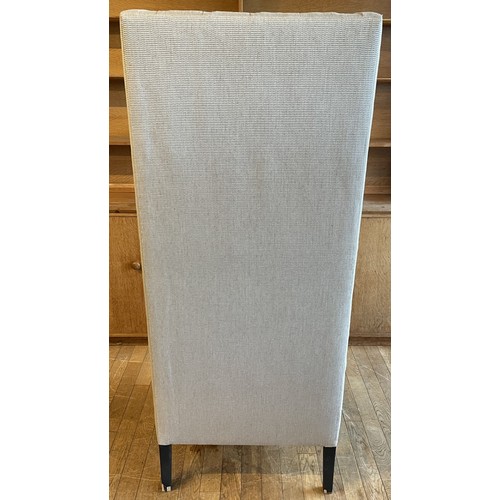 374 - A contemporary Safavieh Mercer style bacall or porters chair,  having high button back with shaped w... 