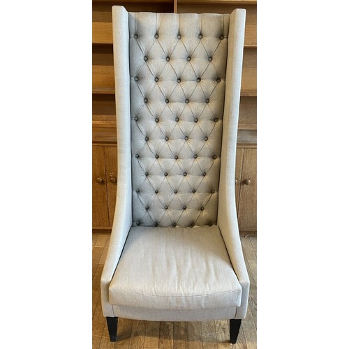 374 - A contemporary Safavieh Mercer style bacall or porters chair,  having high button back with shaped w... 