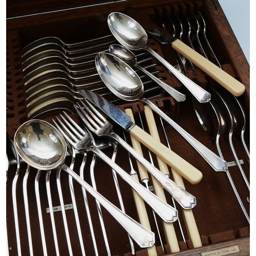 10 - An Art Deco pattern Mappin & Webb canteen of cutlery, for 12 place settings, table knifes with Ivori... 