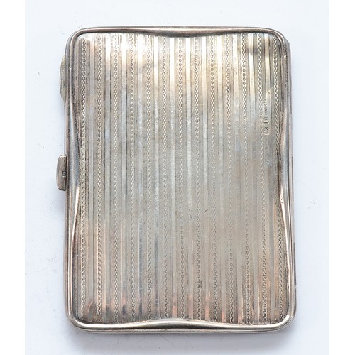 29 - A silver card case, Birmingham 1911, with fitted interior and initials engraves to the front, 11x8cm... 