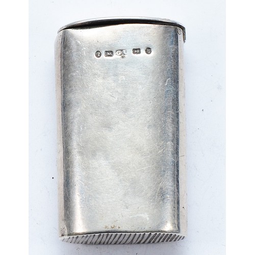 32 - A Victorian silver vesta case, Birmingham 1869, with engraved Griffin to the top, and engraved initi... 