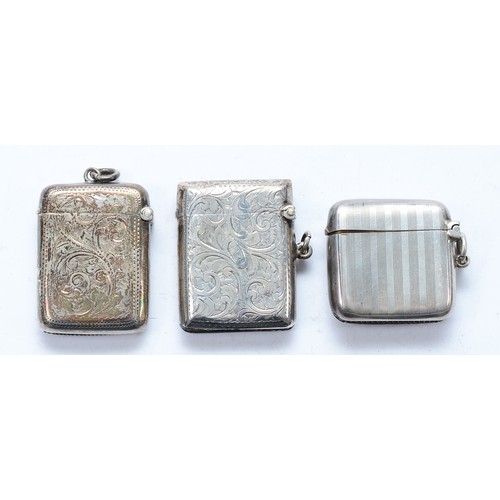 34 - Three silver vesta cases, Chester 1899, 1911, Birmingham 1904, 72gm.