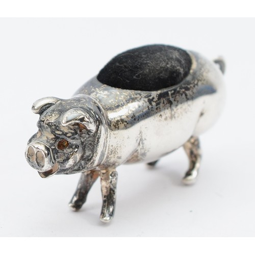 40 - A contemporary silver pin cushion in the form of a pig, Birmingham 925, post 1998 hallmarks, 5cm.