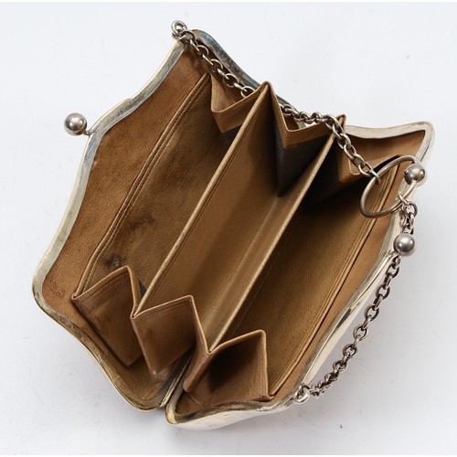 42 - A silver purse, Birmingham 1918, with engraved initials to the front, and fitted interior, 11x8cm, 8... 