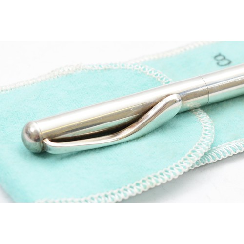 49 - Tiffany & Co, a silver lidded pen with fabric Tiffany pouch.