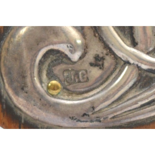 10 - An Art Nouveau silver and enamel oak easel clock, by J. Gloster, Birmingham 1907, with sinuous embos... 