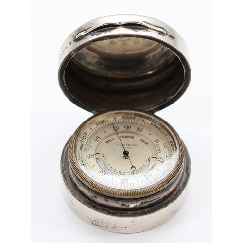 34 - A George V silver cased aneroid barometer/thermometer, by J.C. Vickery, London 1914, retailed by the... 
