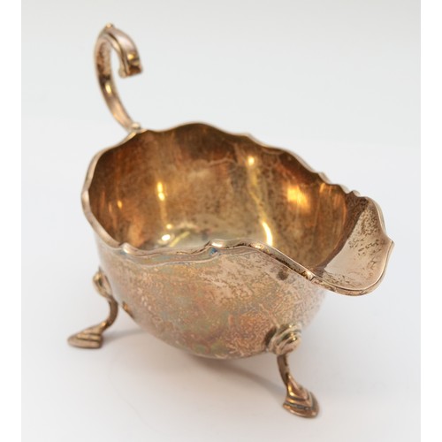 23 - A Scottish silver sauce boat, Glasgow 1925, by Robert Scott, 17x10cm, 191gm.
