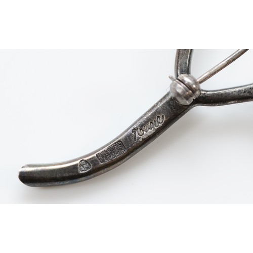 51 - Anton Michelsen, a 925 Danish silver mistletoe brooch designed by Gertrude Engel Rougie, 75mm, 12g