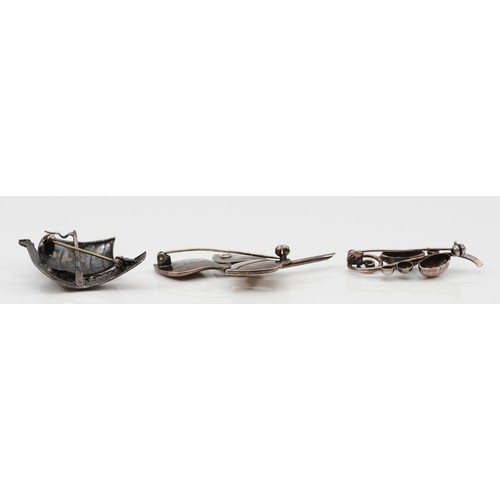 53 - S. Christian Fogh, a Danish Silver leaf brooch, 60mm, FT Denmark, a silver longboat brooch, 40mm, an... 