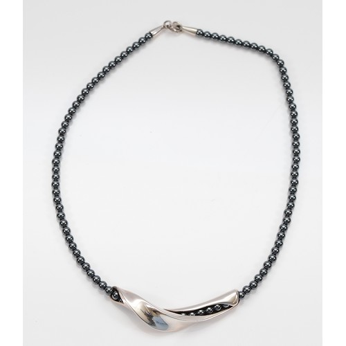 59 - Georg Jensen and Hans Hansen, a 925 silver and hematite beaded necklace, 3mm beads, 40cm, with box