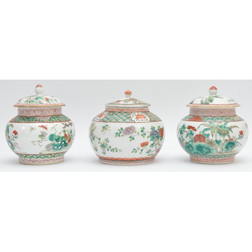 380 - A Chinese set of three famile vert lidded jars, six character Qianlong Mark, decorated with birds am... 