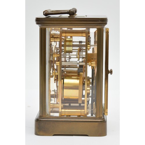 384 - Matthew Norman, a brass alarm and striking carriage clock, signed white enamel dial with Roman numer... 