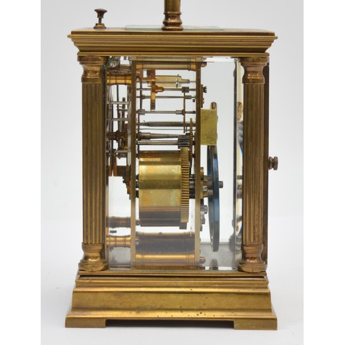 386 - An early 20th century brass repeating and striking carriage clock, white enamel dial with Roman nume... 