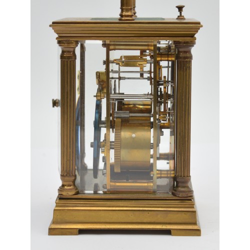 386 - An early 20th century brass repeating and striking carriage clock, white enamel dial with Roman nume... 