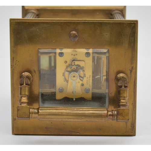 386 - An early 20th century brass repeating and striking carriage clock, white enamel dial with Roman nume... 