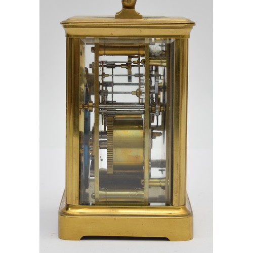 396 - An early 20th century brass striking carriage clock, the white enamel dial signed David Innes, Londo... 