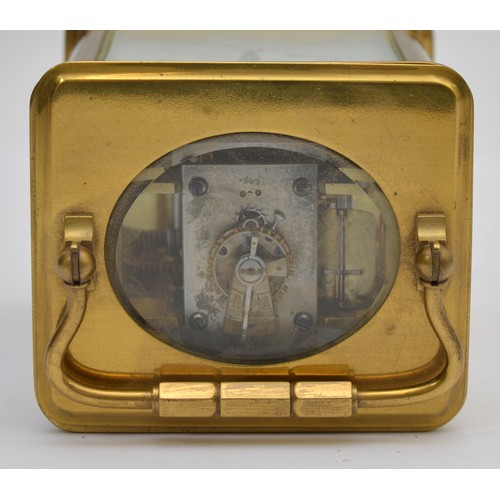 396 - An early 20th century brass striking carriage clock, the white enamel dial signed David Innes, Londo... 