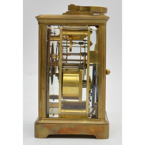 397 - A mid 20th century French brass striking carriage clock, having enameled dial with Roman numerals, b... 