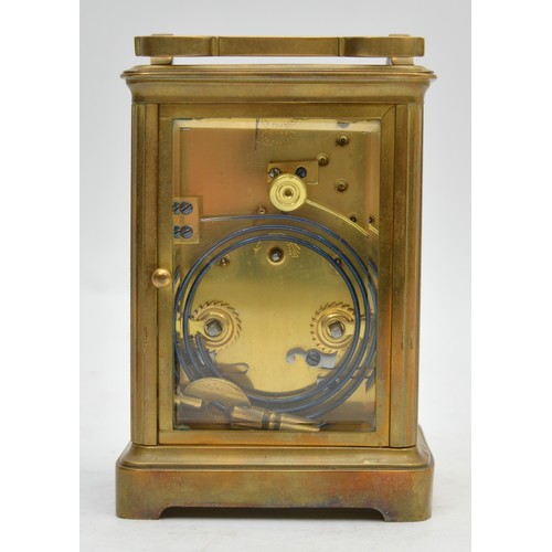397 - A mid 20th century French brass striking carriage clock, having enameled dial with Roman numerals, b... 