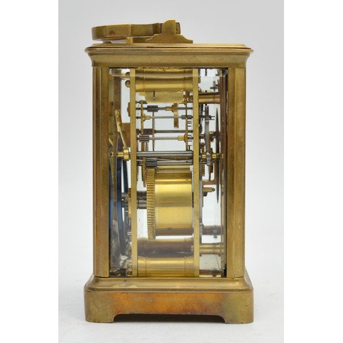397 - A mid 20th century French brass striking carriage clock, having enameled dial with Roman numerals, b... 