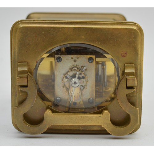 397 - A mid 20th century French brass striking carriage clock, having enameled dial with Roman numerals, b... 